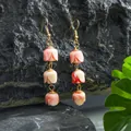 Detail of handmade tulip drop earrings with pink resin beads on black volcanic rock - Light Pink Striped (HWX2727-5)