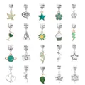 Detailed grid of 20 assorted alloy enamel charms for DIY jewelry and bracelets - Green Style