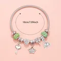 Detail of silver beaded bracelet featuring heart charms and green rhinestones, 18cm length - Green