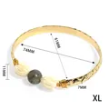 Ethnic gold bangle with tiger eye bead and carved jasmine flowers in size XL - Labradorite Style (74mm-XL)