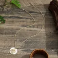Detail of gold sea turtle pendant with white shell inlay and twisted rope chain design - Sea Turtle Style (HWBN984)