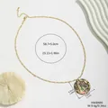 Golden necklace featuring a circular pendant with iridescent natural shell inlay and geometric detail - Geometric Outline Style (HWBN80)
