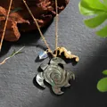 Detail of golden turtle necklace with iridescent mother of pearl shell and seahorse charm - Turtle Seahorse Style (HWNX878ST-9)