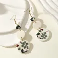 Handmade clay floral dangle earrings with white discs and green leaves for women - White Polymer Clay Floral Relief Style (PLE0285)