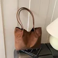 Brown faux suede tote bag with dual shoulder straps for casual commuting and retro style - Brown