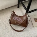 Brown moon-shaped crescent bag with adjustable strap and silver decorative chain - Brown Large