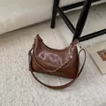 Brown faux leather hobo bag with silver chain detail and adjustable shoulder strap - Brown Small