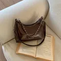 Dark brown patent leather hobo bag with a silver chain strap and half-moon design - Coffee Small