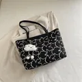Black star patterned tote bag in wrinkled fabric with a white cloud charm accessory - With Cloud Plush Pendant / Black