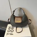 Minimalist grey suede half-moon crossbody bag with brown leather flap and top handle - No Pendant / Gray