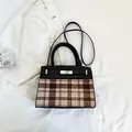 Elegant retro patchwork handbag in black leather and pink coffee plaid texture - Black