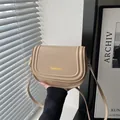 Sacoche selle beige chic avec lettrage doré et bandoulière réglable pour femme - Kaki