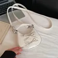 Piccola borsa a tracolla bianco crema a mezzaluna con fiocchi decorativi - Bianco