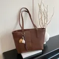 Brown crocodile embossed tote bag with baseball charm for daily commuting style - Brown with Pendant