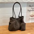 Minimalist brown suede tote bag with contrast white stitching and mini purse charm - Brown