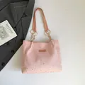 Pink tote bag with silver star sequins and gold chain handle on a grey suit background - Pink Without Pendant