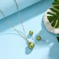Detailed close-up of gold necklace and green pearl studs with coral and leaves - Grass Green (HWNX8841-5)
