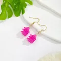 Macro shot of rose pink floral resin drop earrings with elegant gold hook hardware - Short / Magenta Short (HWX305PR)