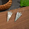 Detail of bohemian shell earrings with carved triangle texture on wood background - Silver Flower Long Triangle Style (HWB263)