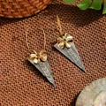 Bohemian gold flower and shell teardrop earrings displayed on natural woven background - Gold Flower Triangle Mother of Pearl Style (HWB301)