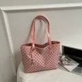 Pink tote bag with all-over M-letter print and golden pendant charm for daily commute - Pink