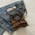 Brown bow-knot shoulder bag with braided handle and adjustable strap in minimalist PU leather - Brown