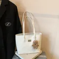 White faux leather tote bag with brown bear keychain for commuting or daily use - With Pendant / White