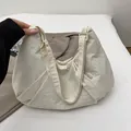 Minimalist creamy white large crescent tote bag with zipper and ruched details - White