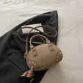 Chic khaki suede bowling bag with silver rivets and long shoulder strap for women - Khaki