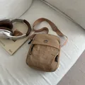 Minimalist beige nylon crossbody phone bag with adjustable wide strap and metal logo - Khaki