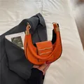 Fashionable bright orange crescent underarm bag with crocodile pattern and gold buckle - Orange
