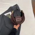 Dark brown crescent shoulder bag in croc-embossed PU leather with gold geometric clasp - Brown