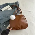 Brown gloss PU leather shoulder bag for women with white faux fur pompom charm - With Pendant / Brown