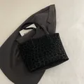 Grote shopper tas met zwarte luipaardprint en lange handvaten voor dames - Zwart