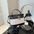 Eimer-Handtasche aus Leinen und schwarzem Leder mit Tragegriff und Kontrast-Design - Schwarz