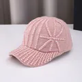 Close-up of pink knit baseball cap with sparkling rhinestones and warm winter texture - Adult Size (Adjustable) / Pink