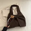 Dark brown suede tote bag with large bow and cute plush bear charm for daily commute - With Pendant / Brown