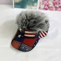 Detail of grey wig visor hat featuring American flag pattern on the brim with fluffy synthetic hair - Adult Size (Adjustable) / Gray
