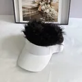 Detail of white cotton sun visor hat featuring black synthetic wig hair and adjustable strap - Adult Size (Adjustable) / White Cap Black Wig