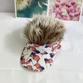 Detail of USA flag printed sun visor cap featuring creative light brown wig hair top - Adult Size (Adjustable) / Coffee Synthetic Hair