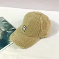 Detail of light khaki lamb wool baseball cap with thick texture and R embroidery - Adult, Adjustable / Beige