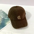 Close-up of thick coffee brown teddy fleece baseball cap with white R letter embroidery - Adult, Adjustable / Coffee