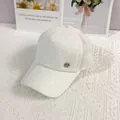 Close-up of white lace baseball cap with sequins and breathable mesh back detail - 56-60cm / White