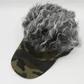 Detail view of camouflage baseball cap with grey wig hair on top for outdoor fun - Large Camo Grey Wig
