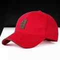 Classic red cotton golf baseball cap with premium brown leather logo patch and curved brim - Red