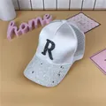 Stylish white baseball cap with silver glitter brim and black R letter embroidery - M (56-58cm) / White