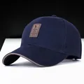 Navy blue cotton golf cap with brown leather patch and contrast brim piping - Dark Blue