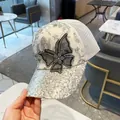 White mesh baseball cap featuring silver sequins, embroidery and a 3D butterfly patch - Adult Adjustable / White