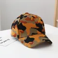 Close-up of camouflage knitted baseball cap showing warm fleece lining and thick fabric - Adult Size (Adjustable) / Yellow