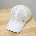 Elegant white floral lace baseball cap with embroidery and gold metal logo badge - White Rhinestone R Label